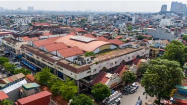 Quá trình chợ Đồng Xuân được xây dựng mới lại thành 3 tầng